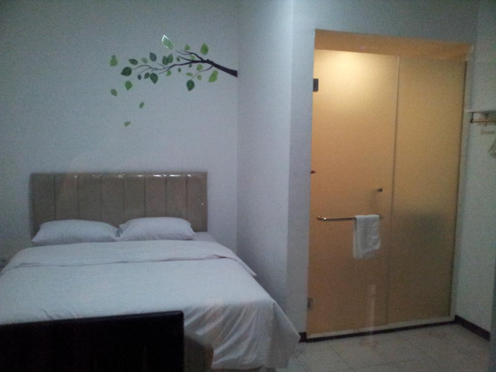 Loxy Inn Surabaya Zimmer foto