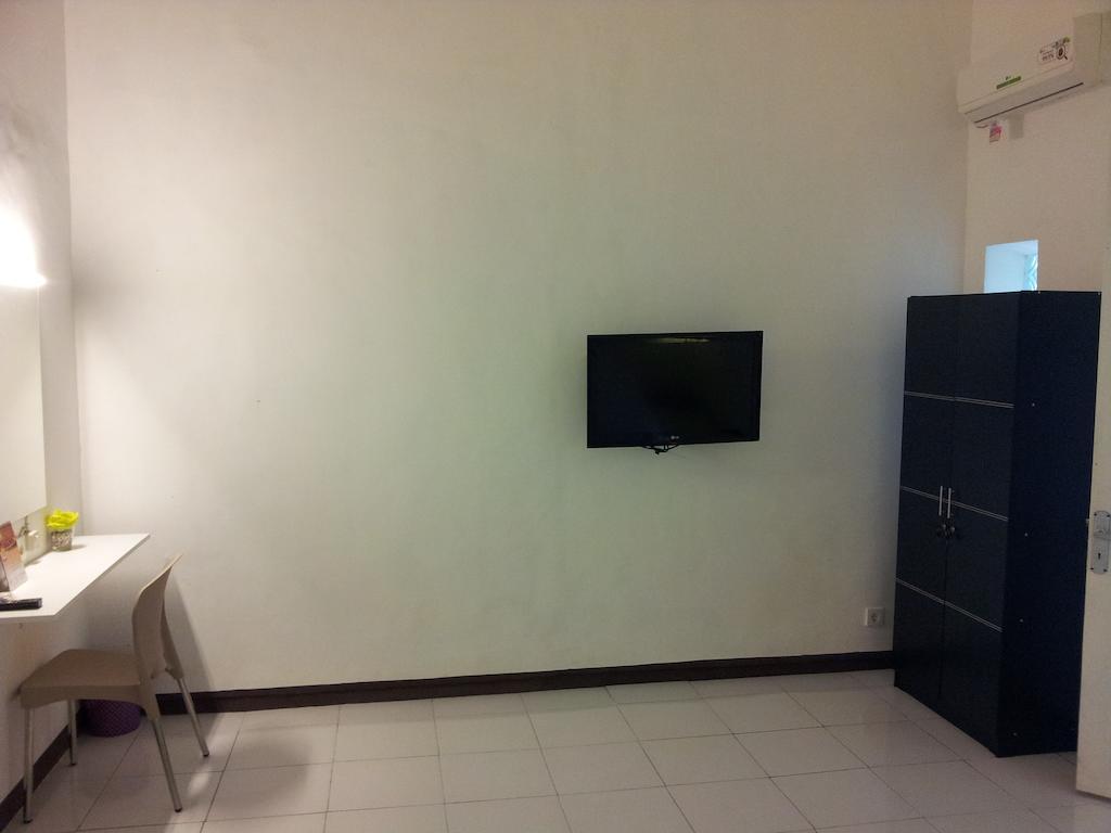 Loxy Inn Surabaya Zimmer foto
